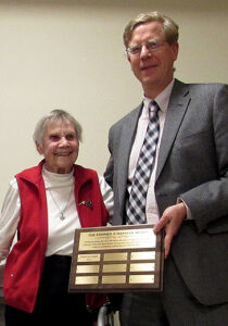 Steve Hansler presenting the award to MaryLou Lamb in 2014.
