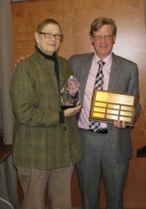 Steve Hansler presenting the award to Mary Ann Gehringer in 2015.
